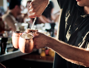 Making a Moscow mule.